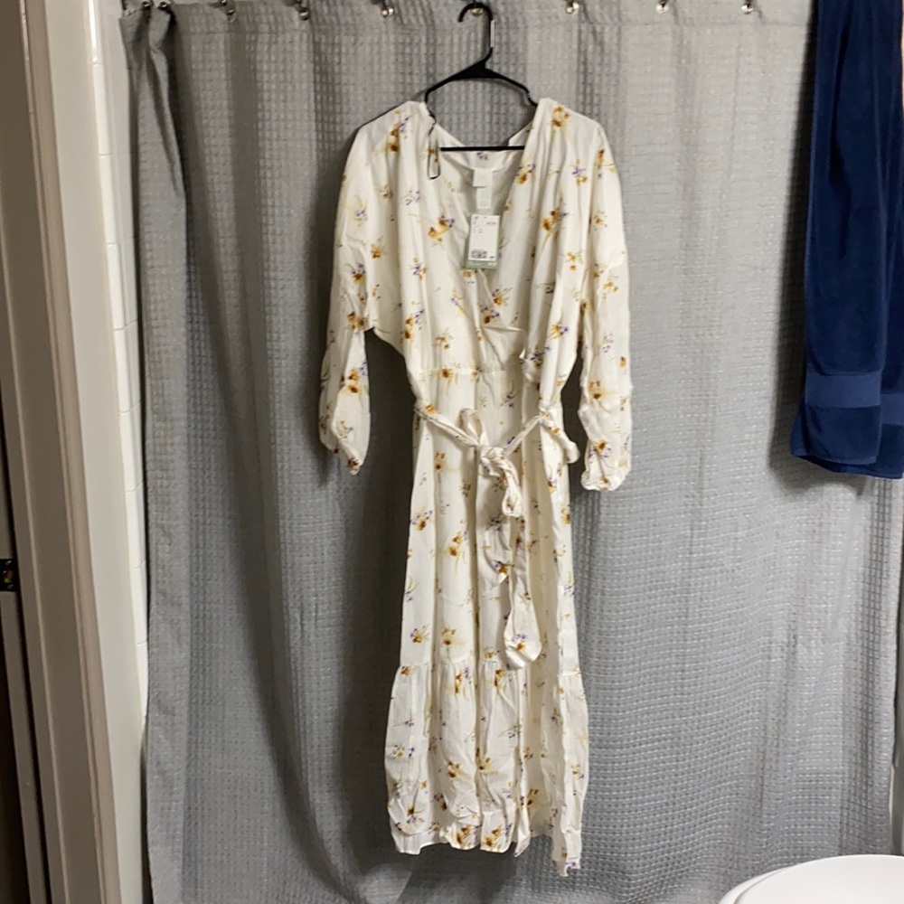 Women’s long cream/white dress with floral design. Linen material